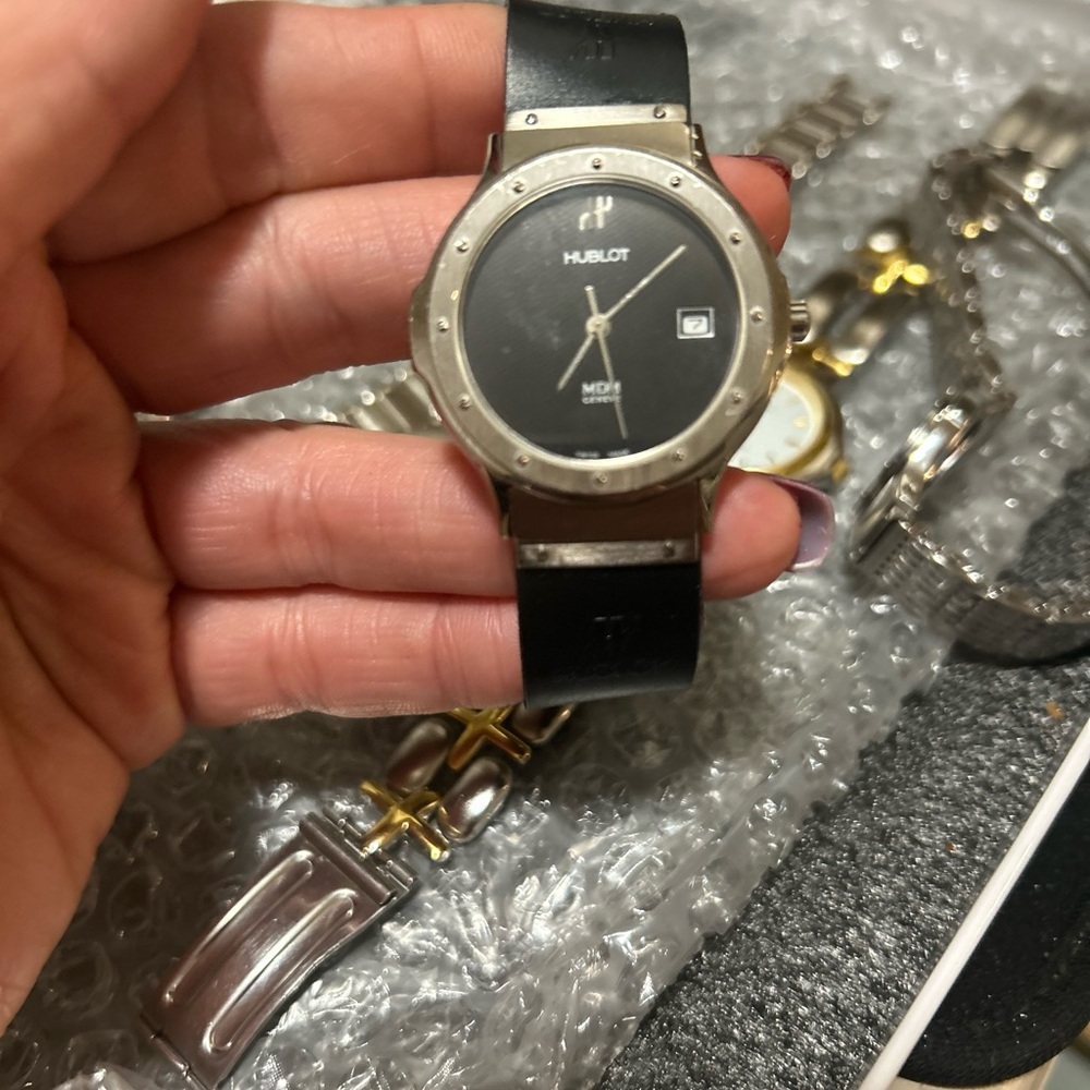 Hublot Classic Black and Silver Smartwatch with Sleek Design